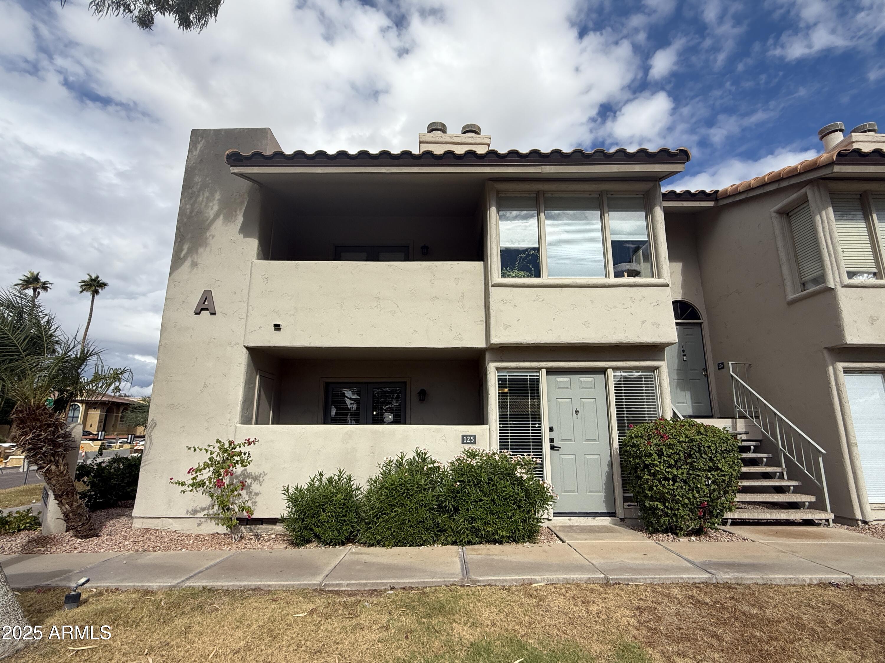 1820 East Morten Avenue, Unit 125 Phoenix, AZ 85020 - Photo 1 of 21 a view of house with yard