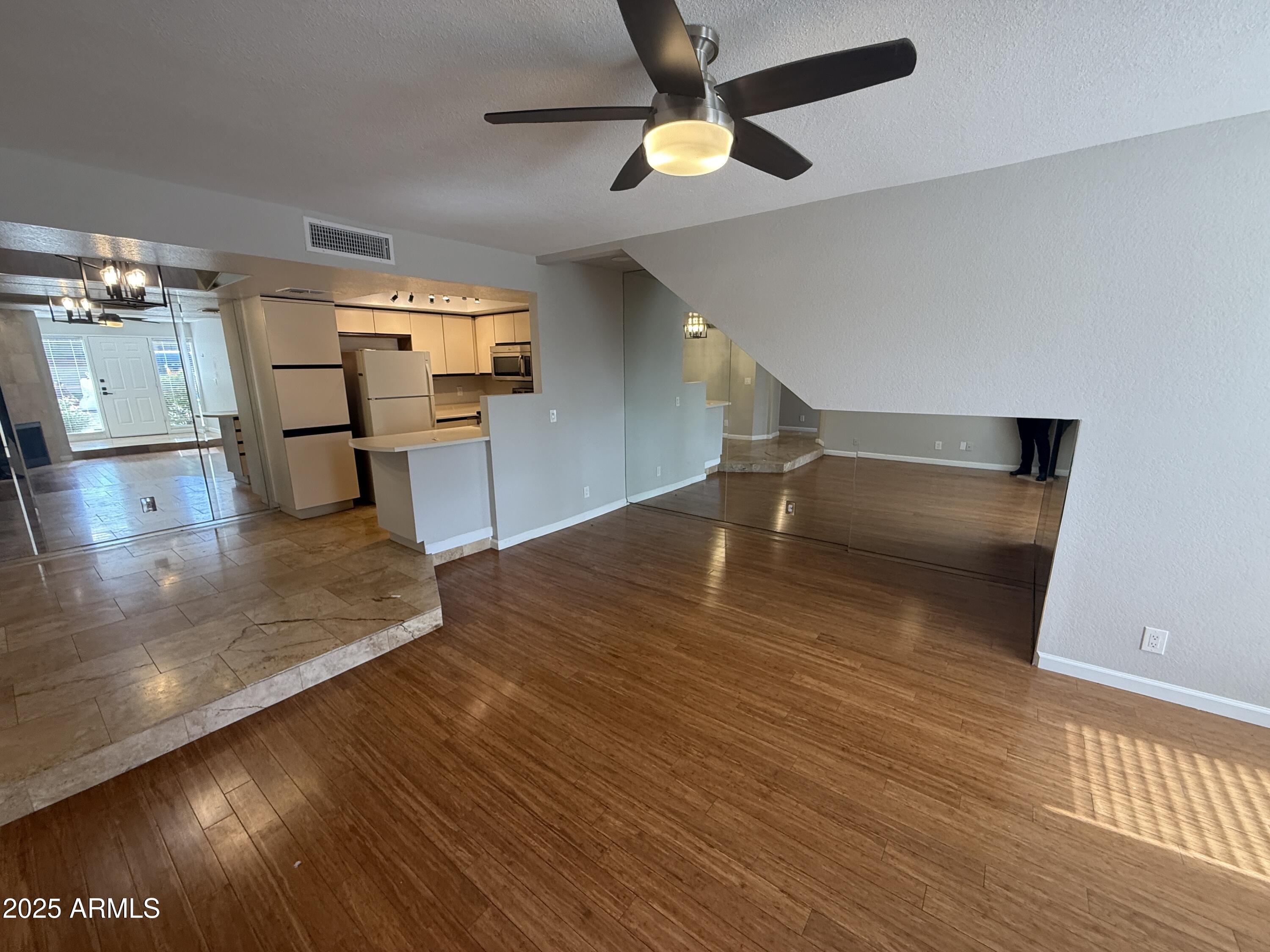 1820 East Morten Avenue, Unit 125 Phoenix, AZ 85020 - Photo 5 of 21 a view of a room with wooden floor