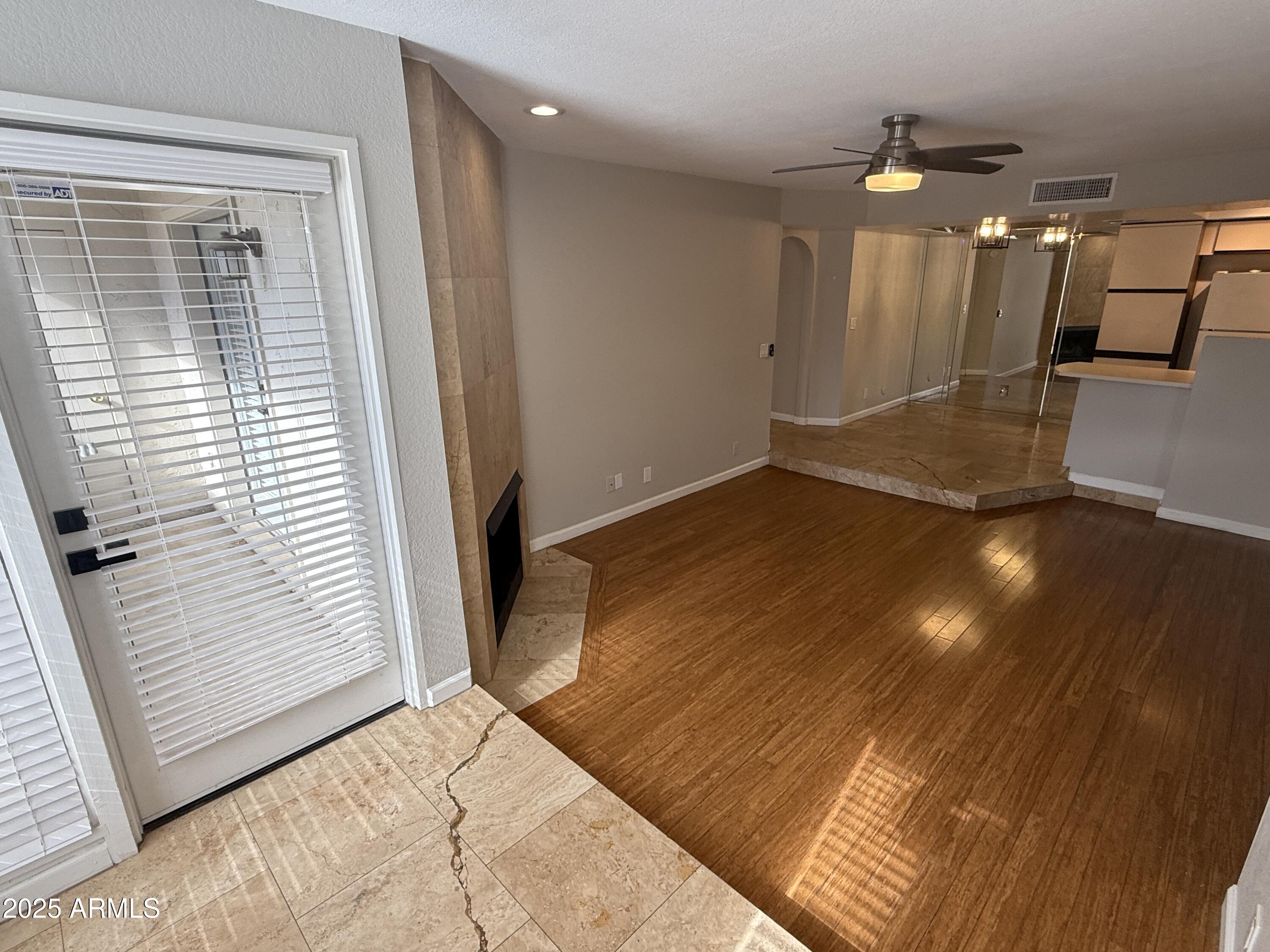 1820 East Morten Avenue, Unit 125 Phoenix, AZ 85020 - Photo 6 of 21 a view of a hallway with stairs