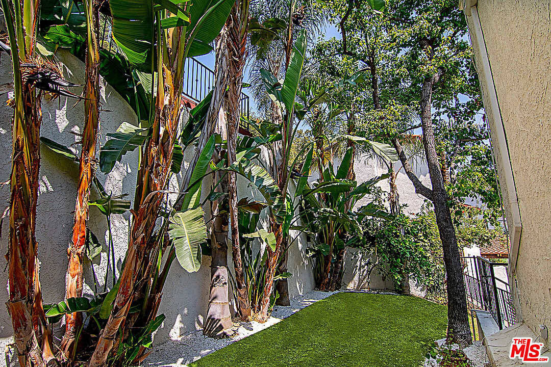 2041 Roscomare Road Los Angeles, CA 90077 - Photo 20 of 28 a view of yard with green space