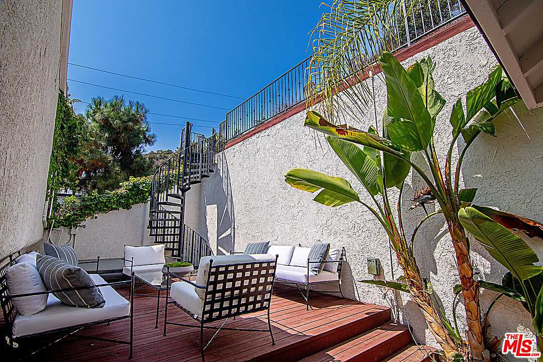 2041 Roscomare Road Los Angeles, CA 90077 - Photo 22 of 28 a outdoor living space with furniture