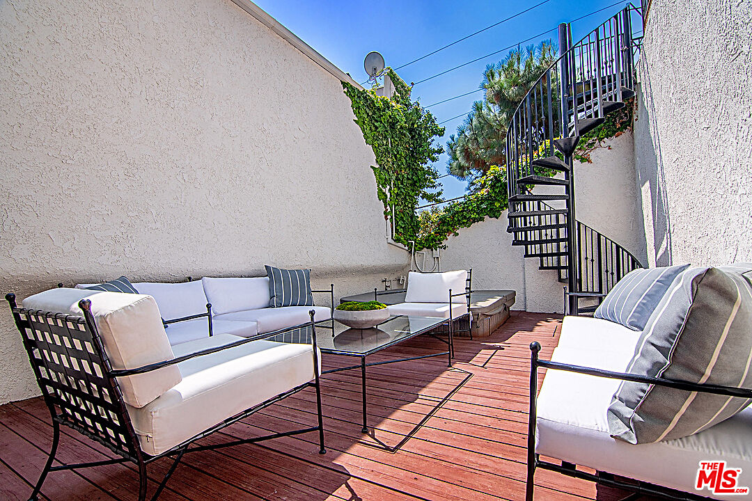 2041 Roscomare Road Los Angeles, CA 90077 - Photo 23 of 28 a outdoor living room with furniture