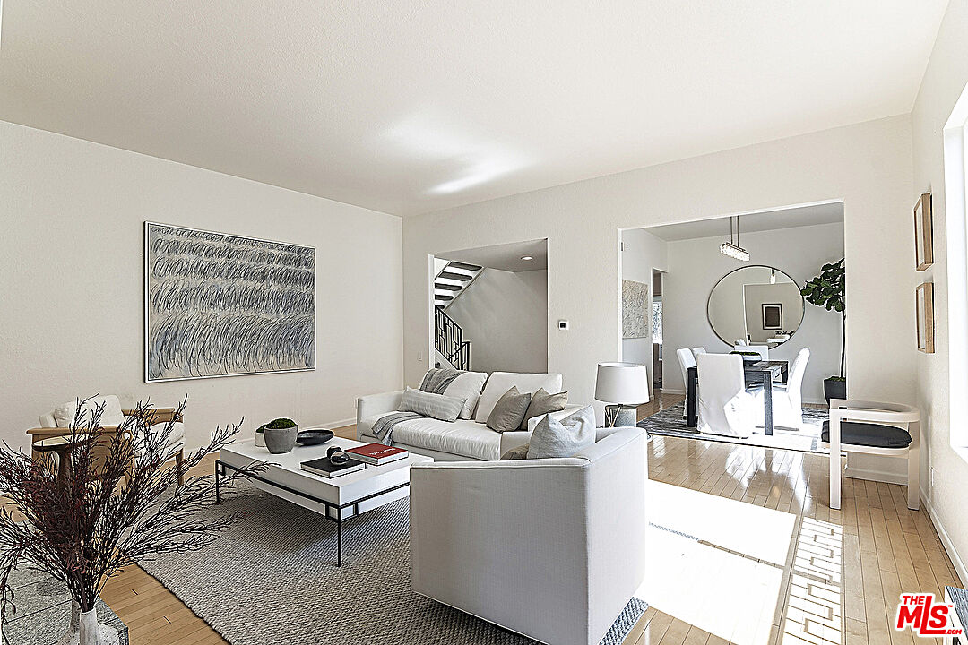 2041 Roscomare Road Los Angeles, CA 90077 - Photo 4 of 28 a living room with furniture