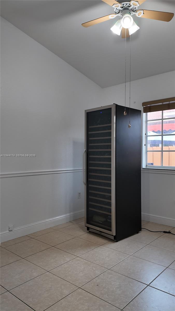 3265 Southwest 153rd Place Miami, FL 33185 - Photo 20 of 39 wooden floor in an empty room with a window
