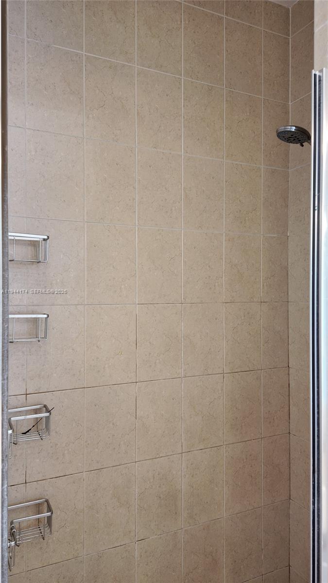 3265 Southwest 153rd Place Miami, FL 33185 - Photo 29 of 39 a bathroom with a shower