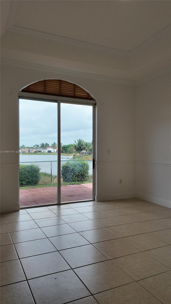 3265 Southwest 153rd Place Miami, FL 33185 - Photo 30 of 39 a view of empty room with floor to ceiling window