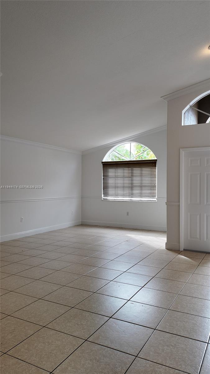 3265 Southwest 153rd Place Miami, FL 33185 - Photo 7 of 39 an empty room with a entryway