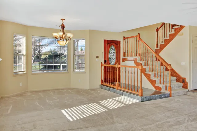 a view of a livingroom with a chandelier