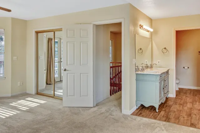 a view of a garden with a building in the background