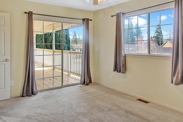 front view of a house with a patio