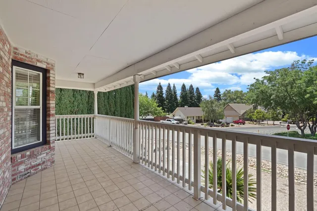 a view of a yard and ocean view