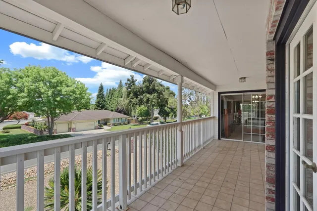 a spacious bathroom with a double vanity sink and a mirror
