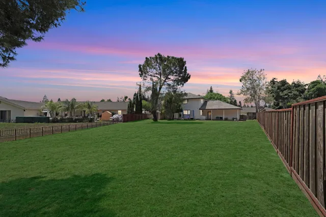 a bathroom with a sink mirror vanity and a bathtub