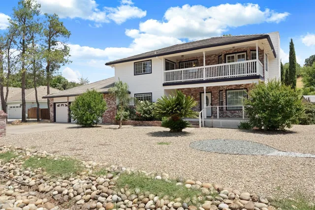 a potted plant sitting in front of a building