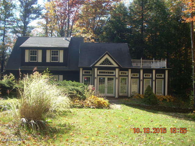 20 West Hubbard Road Sandisfield, MA 01255 - Photo 1 of 15 a front view of a house with a yard