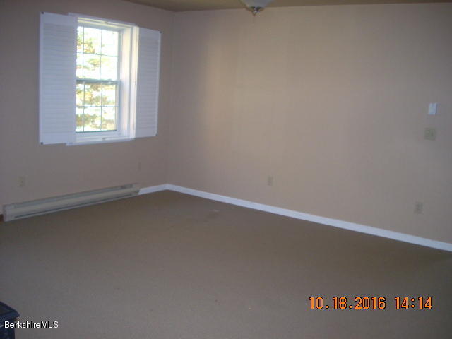 20 West Hubbard Road Sandisfield, MA 01255 - Photo 13 of 15 an empty room with a window