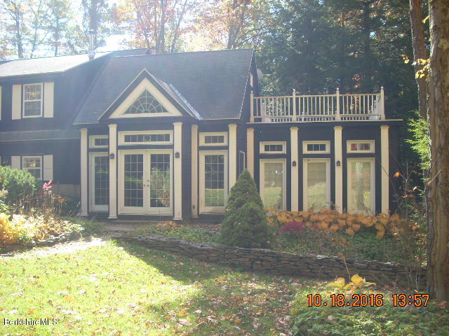 20 West Hubbard Road Sandisfield, MA 01255 - Photo 3 of 15 a front view of a house with a yard