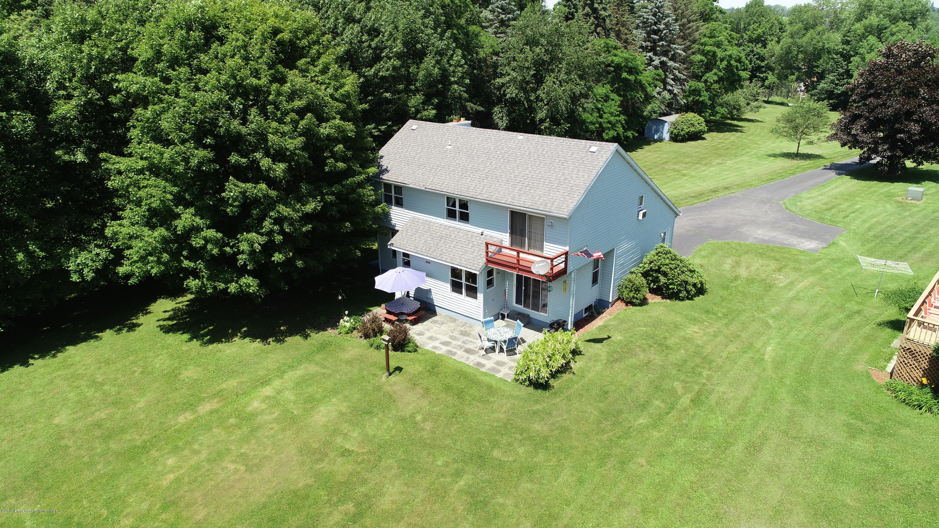 1315 Old County Road Montrose, PA 18801 - Photo 1 of 74 an aerial view of a house with garden space and street view