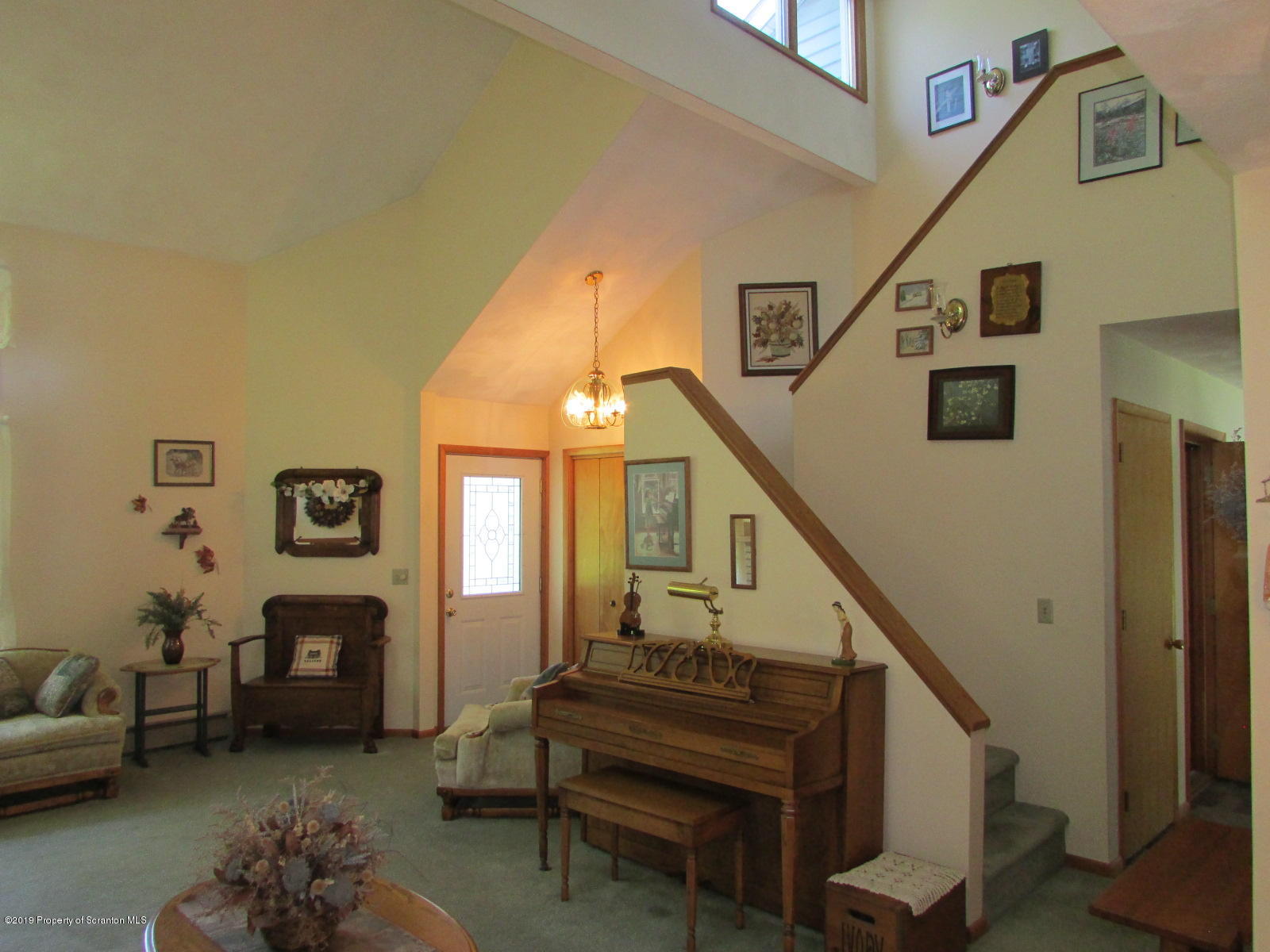 1315 Old County Road Montrose, PA 18801 - Photo 26 of 74 a living room with furniture and a stairs