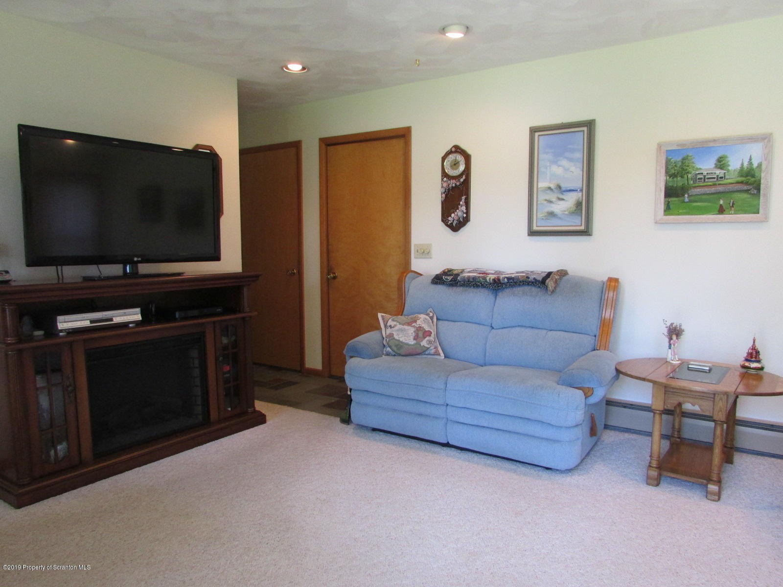 1315 Old County Road Montrose, PA 18801 - Photo 28 of 74 a living room with furniture and a flat screen tv