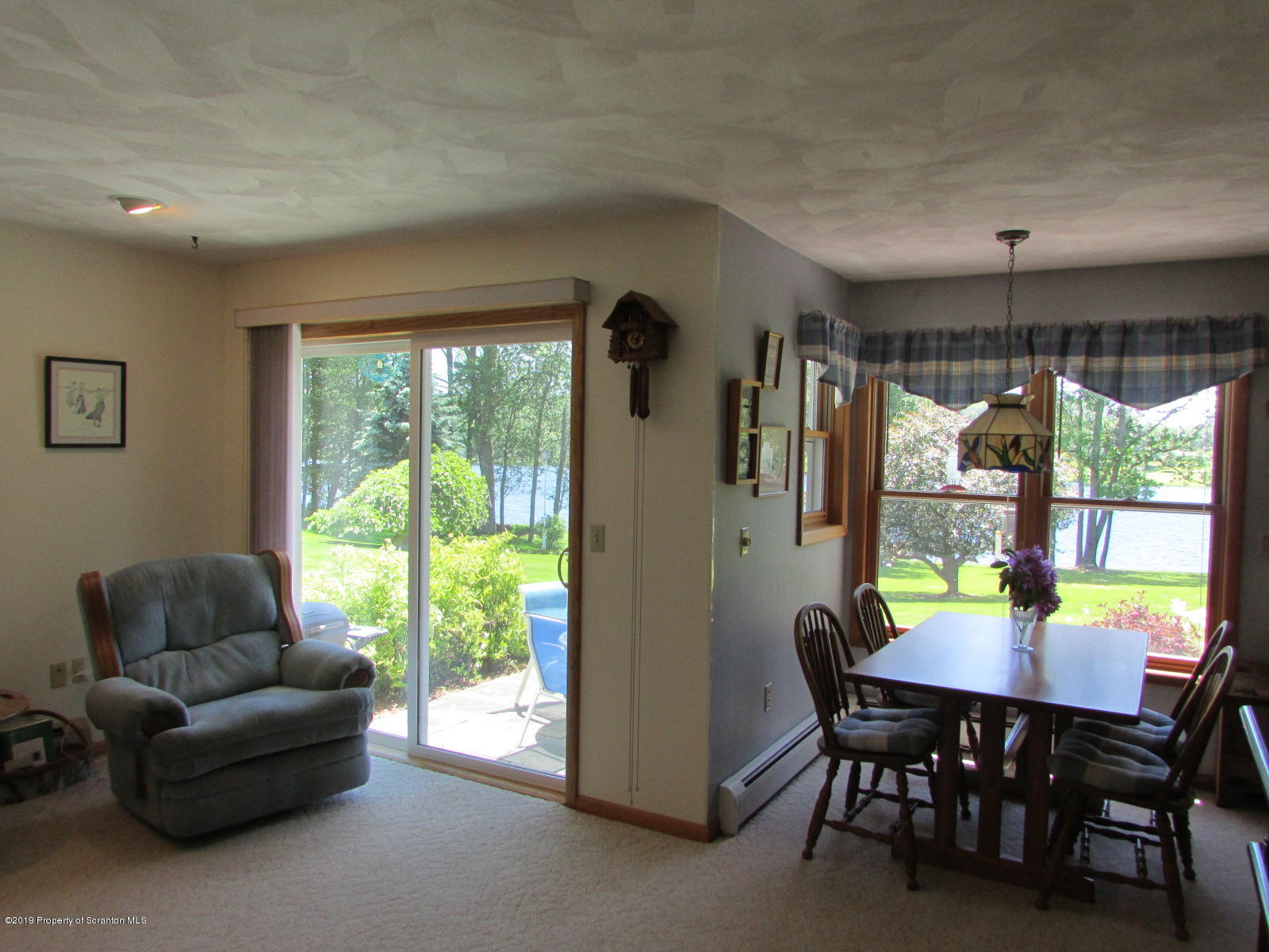 1315 Old County Road Montrose, PA 18801 - Photo 31 of 74 a view of a dining room with furniture window and outside view
