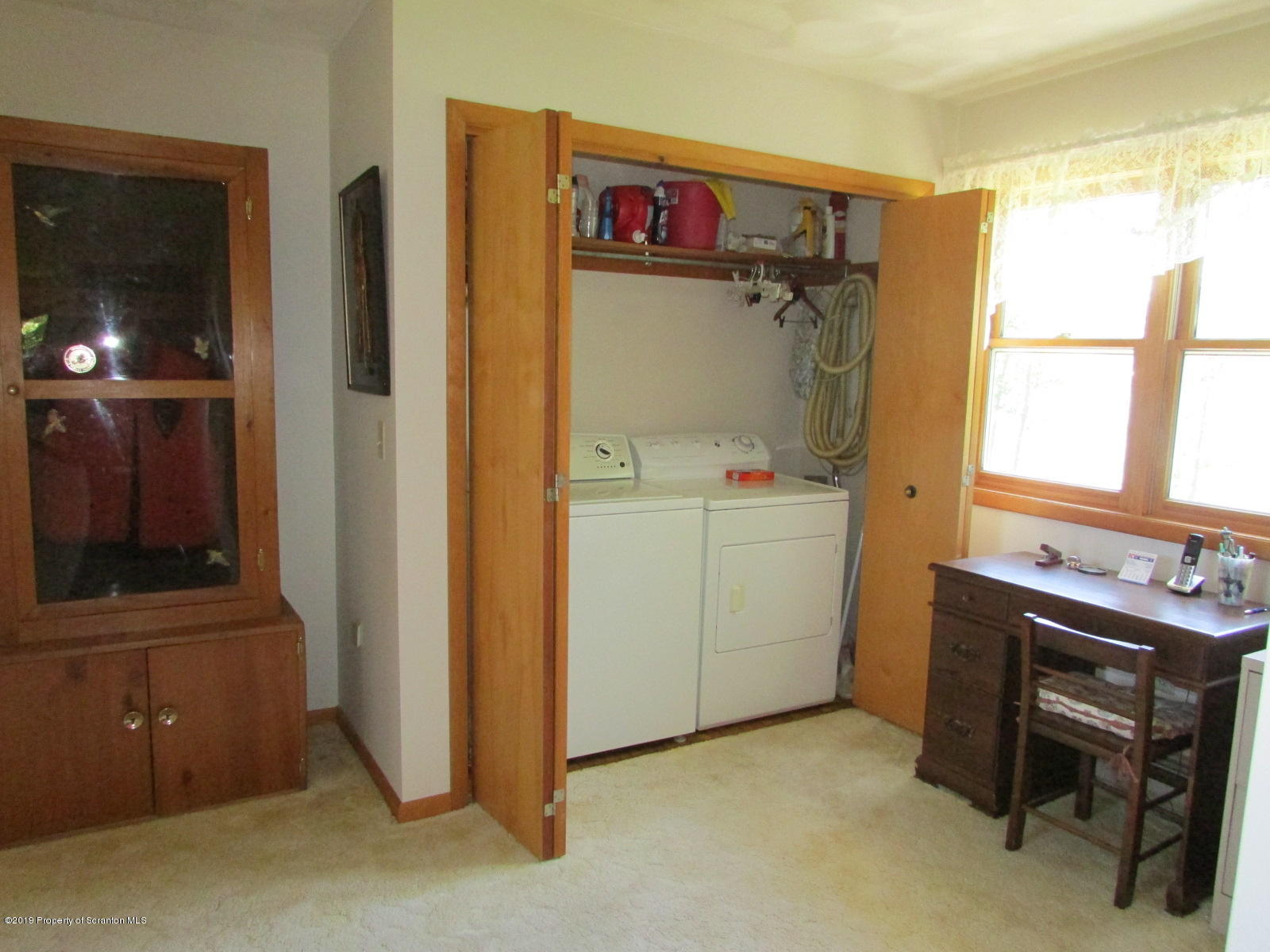 1315 Old County Road Montrose, PA 18801 - Photo 34 of 74 a utility room with a refrigerator and a washer dryer