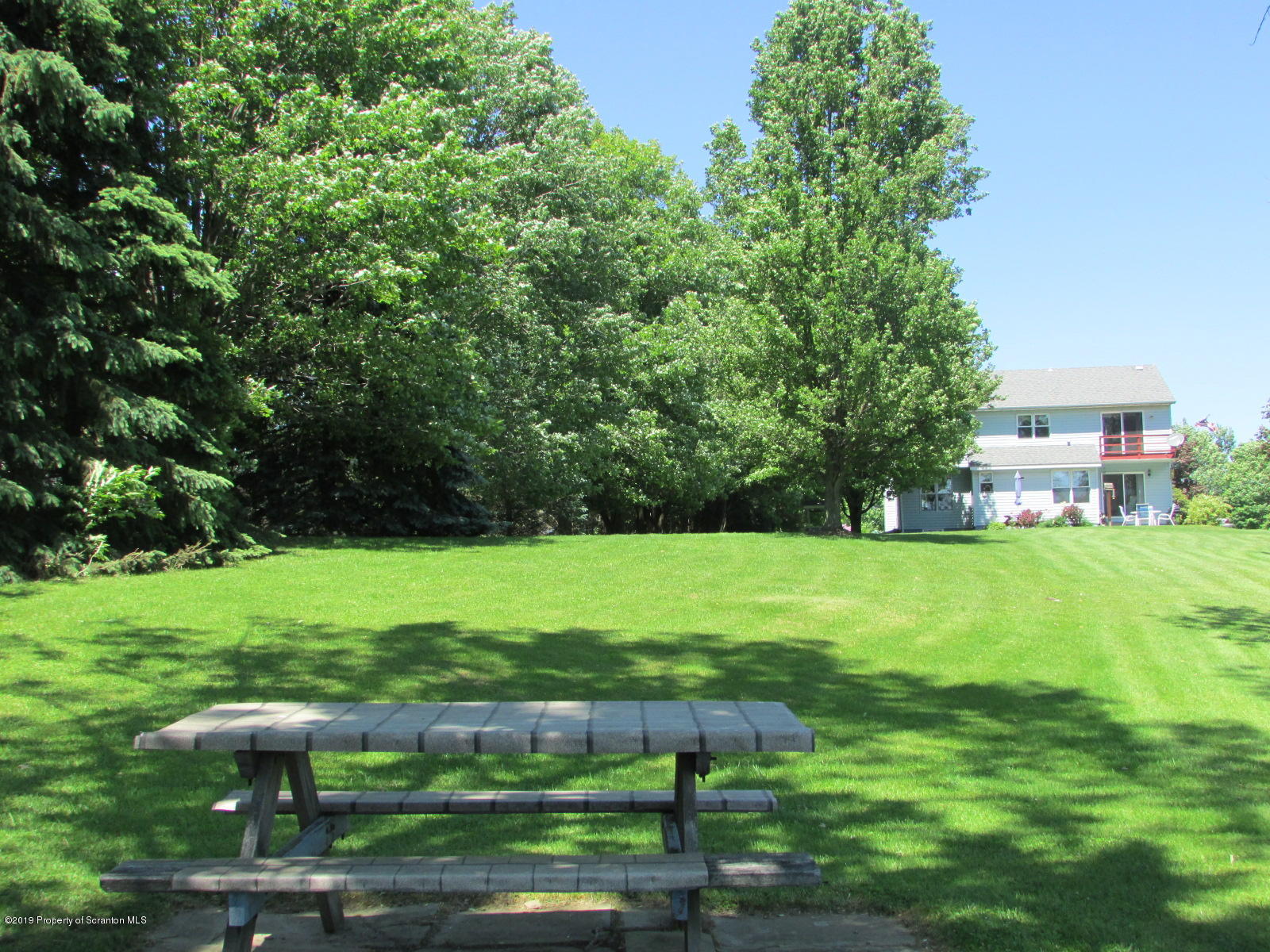 1315 Old County Road Montrose, PA 18801 - Photo 58 of 74 a view of yard with swimming pool and green space