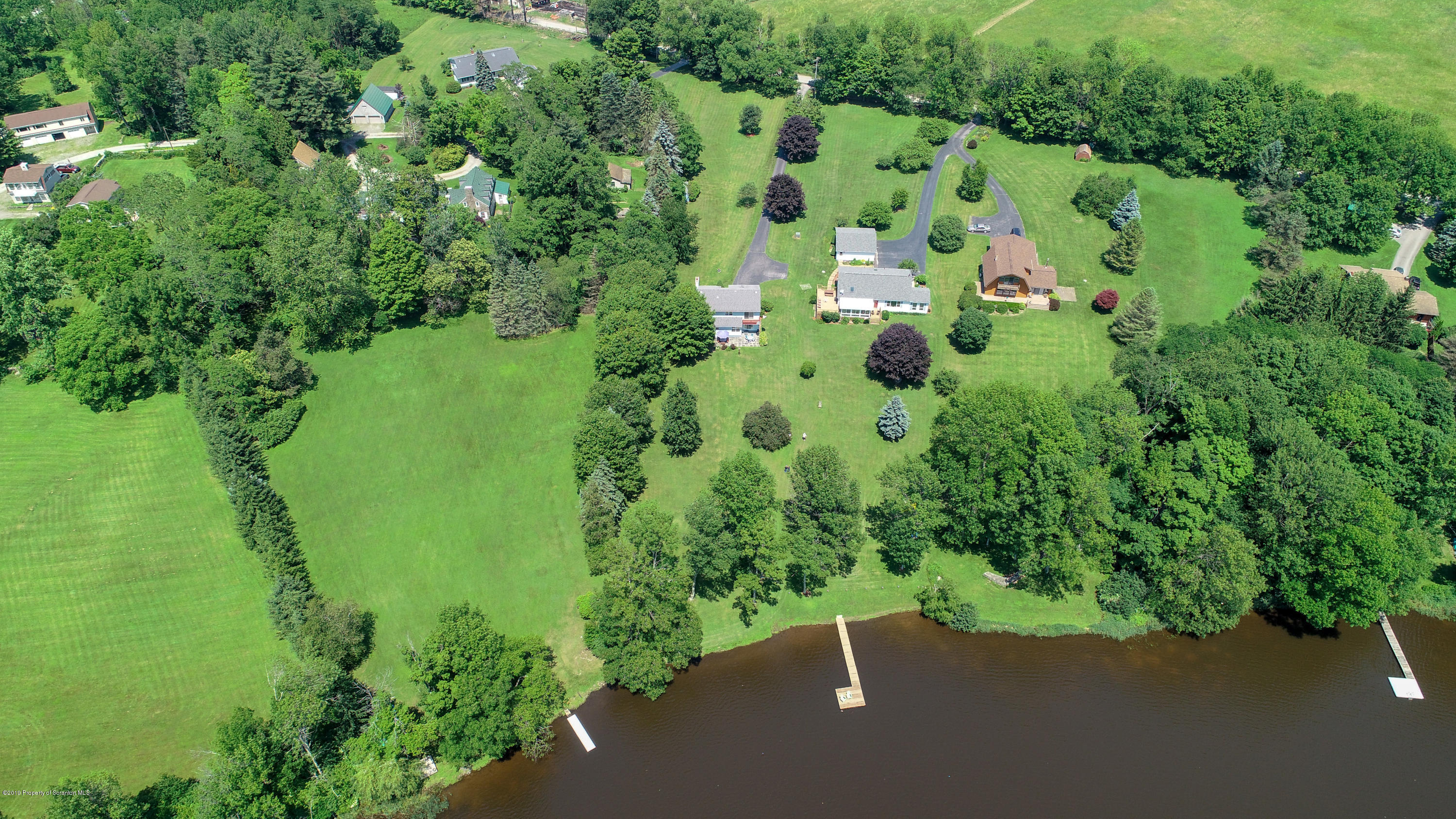1315 Old County Road Montrose, PA 18801 - Photo 73 of 74 an aerial view of a house with a yard