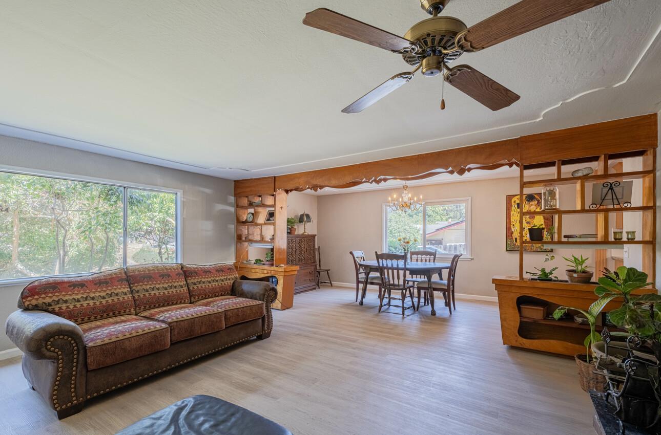 454 Paradise Road Salinas, CA 93907 - Photo 7 of 31 a living room with furniture a ceiling fan and a window