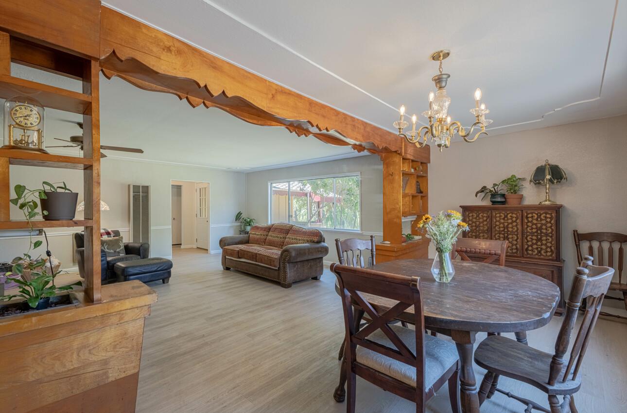 454 Paradise Road Salinas, CA 93907 - Photo 8 of 31 a view of a dining room with furniture and chandelier