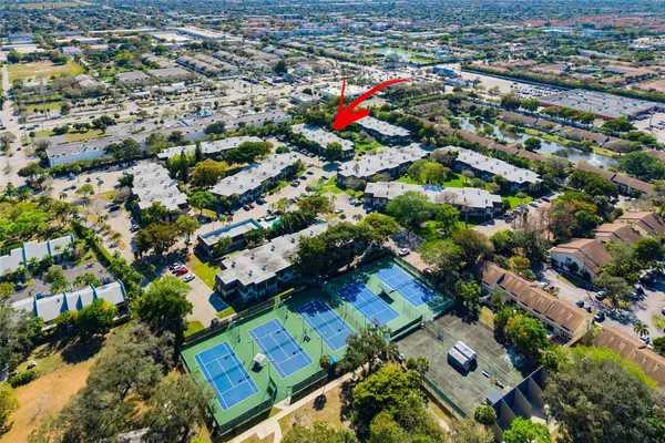 an aerial view of a city with lots of residential buildings