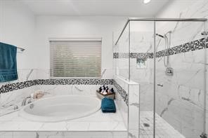 907 Frio Street Houston, TX 77012 - Photo 20 of 23 a bathroom with a tub and shower