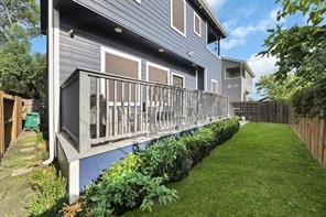907 Frio Street Houston, TX 77012 - Photo 23 of 23 a view of backyard with barbeque grill and wooden fence
