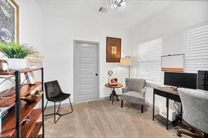 907 Frio Street Houston, TX 77012 - Photo 4 of 23 a living room with furniture and a flat screen tv