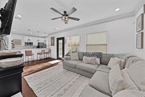 907 Frio Street Houston, TX 77012 - Photo 10 of 23 a living room with furniture and a flat screen tv