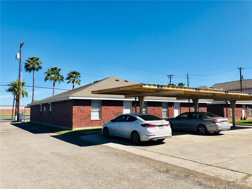 2508 East U.S. Business 83, Unit 27 Mission, TX 78572 - Photo 12 of 14 a car parked in front of a building