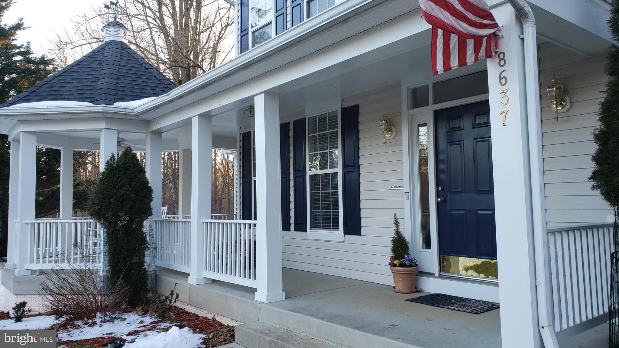 8637 Willow Run Road Baltimore, MD 21244 - Photo 2 of 56 a view of a house with a door and wooden floor