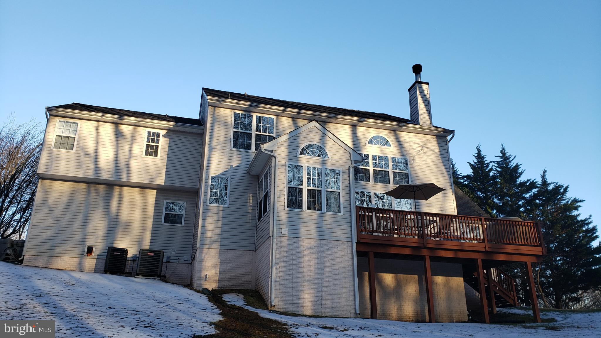 8637 Willow Run Road Baltimore, MD 21244 - Photo 11 of 56 a front view of a house with balcony