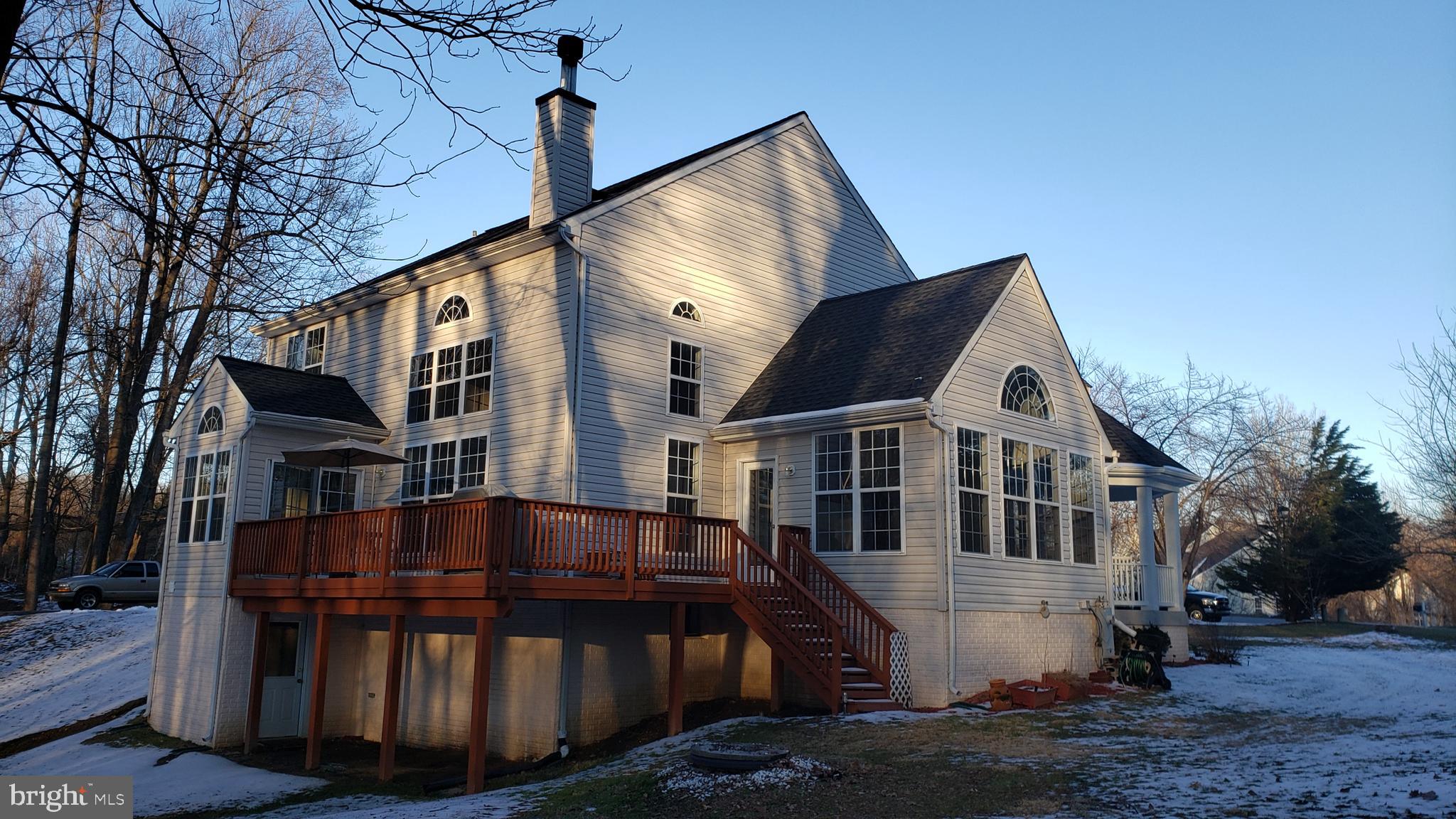8637 Willow Run Road Baltimore, MD 21244 - Photo 12 of 56 a view of a house with a yard