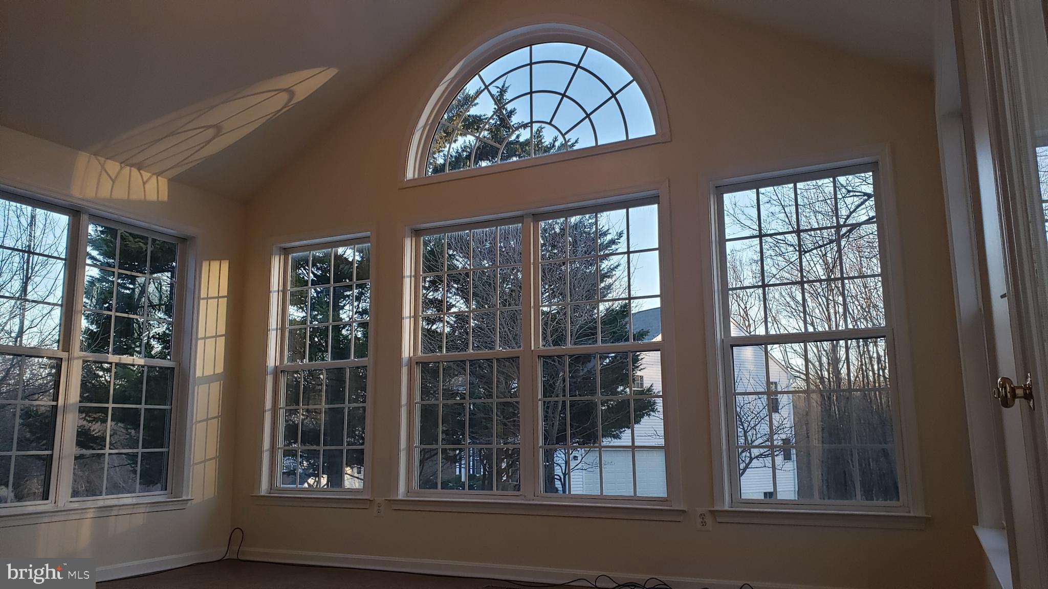 8637 Willow Run Road Baltimore, MD 21244 - Photo 25 of 56 front view of a house with a large window