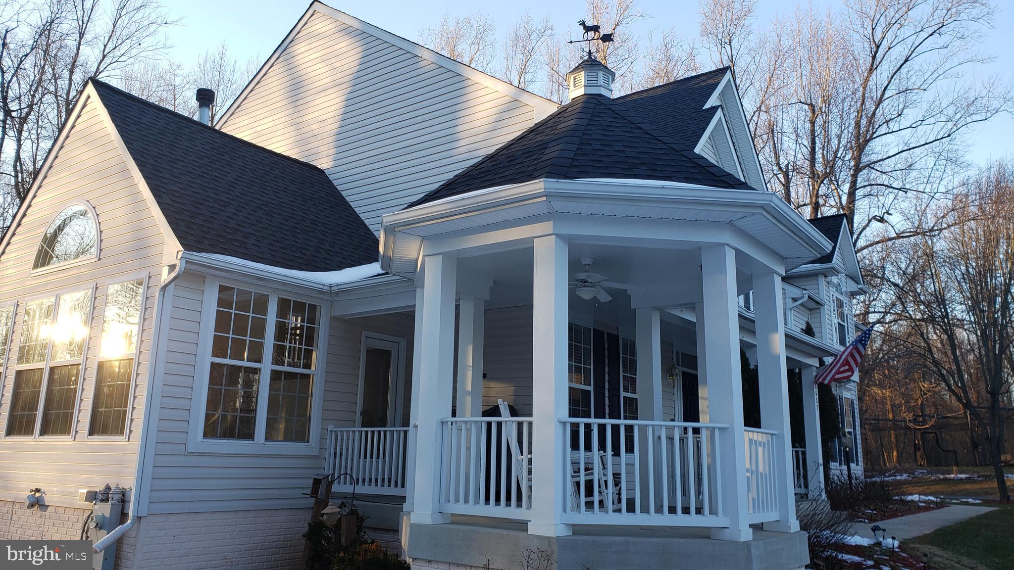 8637 Willow Run Road Baltimore, MD 21244 - Photo 4 of 56 a view of a house with a porch