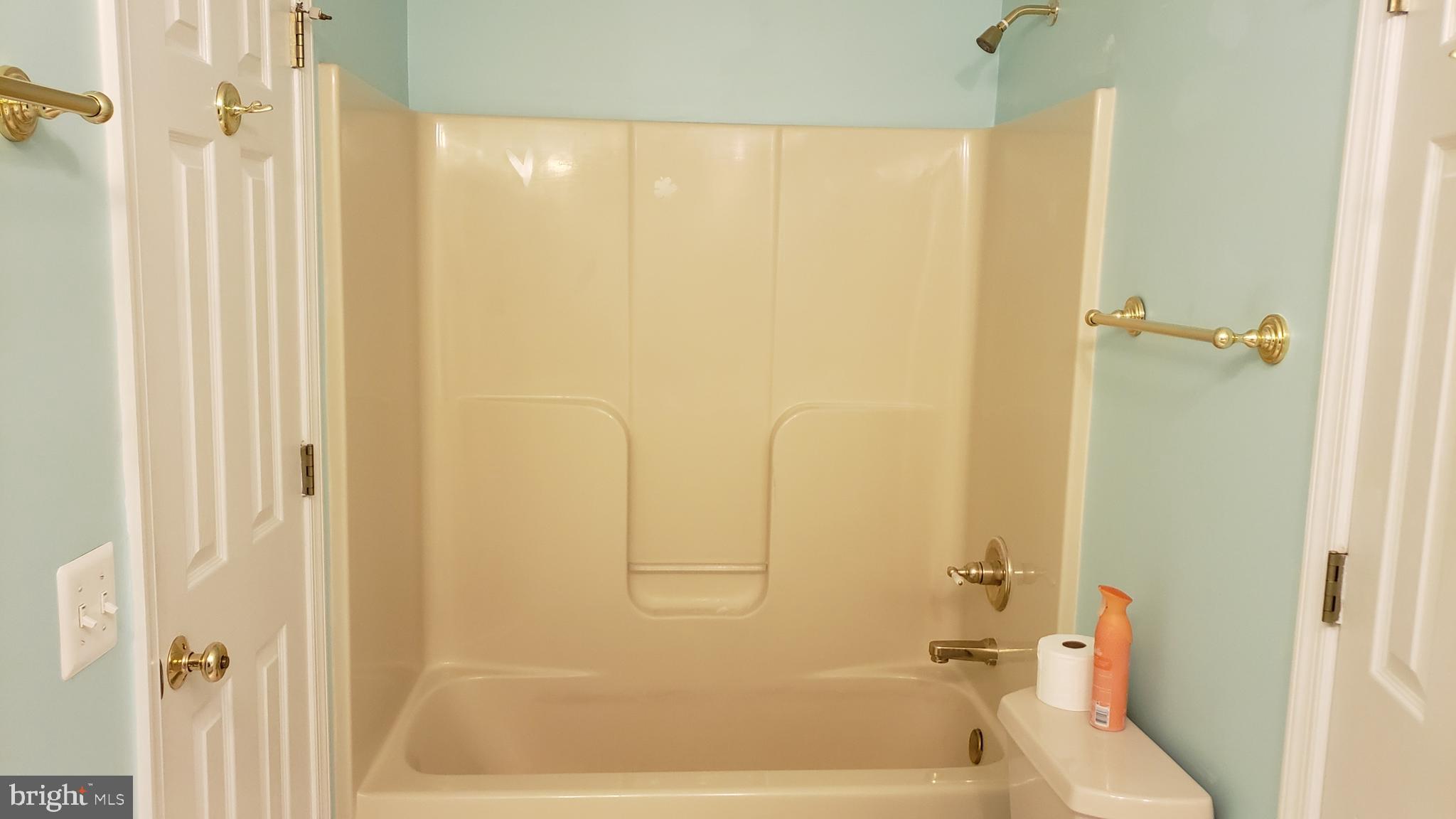 8637 Willow Run Road Baltimore, MD 21244 - Photo 40 of 56 a bathroom with a bathtub