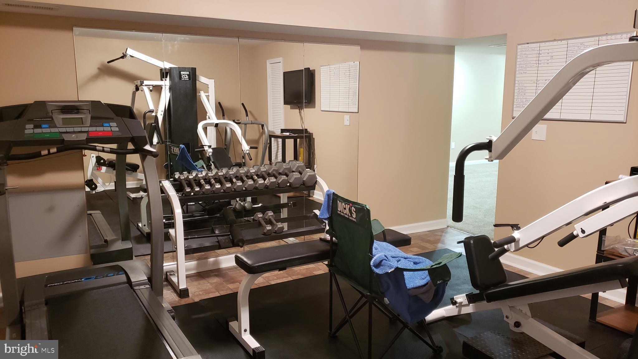 8637 Willow Run Road Baltimore, MD 21244 - Photo 55 of 56 a view of a room with gym equipment