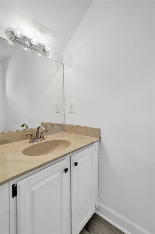 11652 Northwest 19th Drive Coral Springs, FL 33071 - Photo 19 of 52 a bathroom with a sink and a mirror