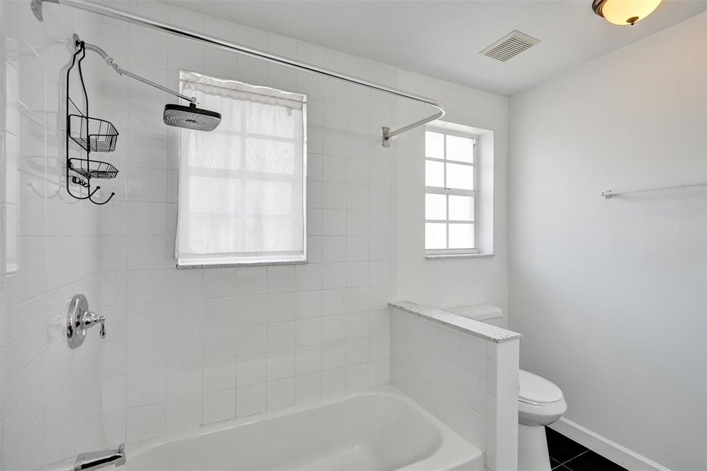 11652 Northwest 19th Drive Coral Springs, FL 33071 - Photo 30 of 52 a bathroom with a bathtub and a shower