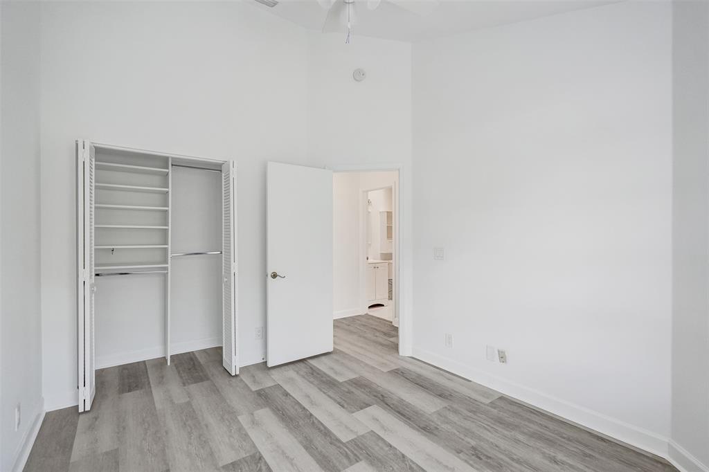 11652 Northwest 19th Drive Coral Springs, FL 33071 - Photo 34 of 52 a view of an empty room with wooden floor