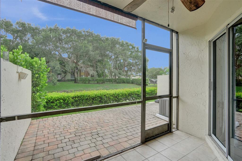 11652 Northwest 19th Drive Coral Springs, FL 33071 - Photo 44 of 52 a view of a back yard from a balcony