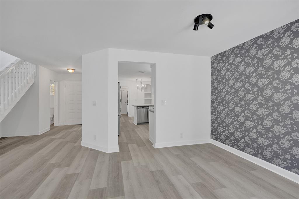 11652 Northwest 19th Drive Coral Springs, FL 33071 - Photo 8 of 52 a view of a room with wooden floor and a sink