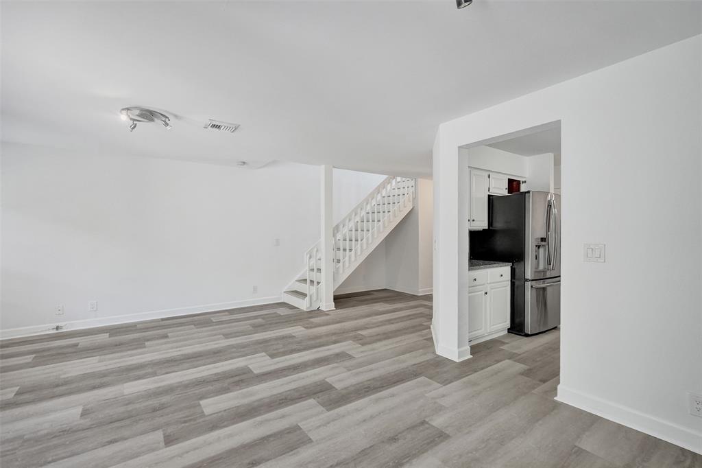 11652 Northwest 19th Drive Coral Springs, FL 33071 - Photo 9 of 52 a view of entryway and hall with wooden floor