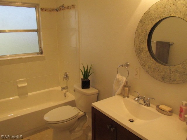 4231 Ellis Road Fort Myers, FL 33905 - Photo 11 of 13 a bathroom with a sink toilet and shower